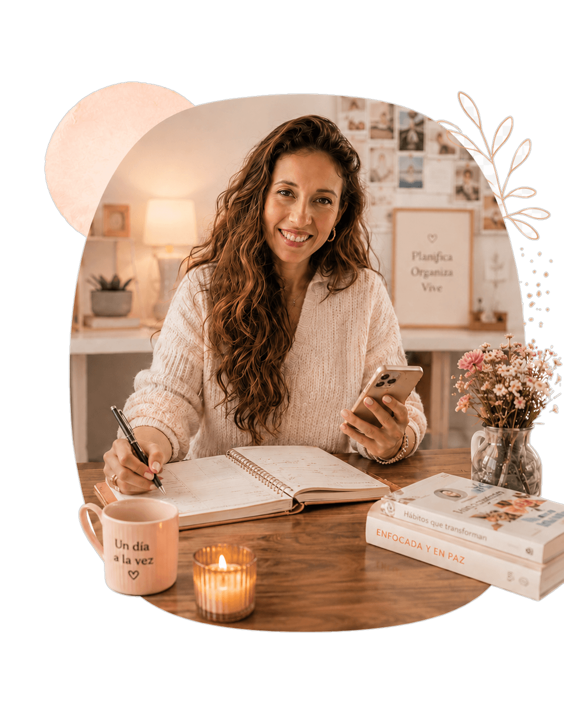 Karina Cortés writing in her planner while holding her phone